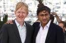 Video editor Chris King and director Asif Kapadia pose for photographers during a photo call for the film Amy, at the 68th international film festival, Cannes, southern France, Saturday, May 16, 2015. (AP Photo/Lionel Cironneau)