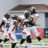 Valdosta State's Matt Pierce (26) celebrates his touchdown on the opening kickoff with teammates Chas Matthews, right, Chris Anderson (80) and Eric Scott (29) in the first half an NCAA Div II national championship college football game against Winston Salem State at Braly Municipal Stadium in Florence, Ala., Saturday, Dec. 15, 2012. (AP Photo/Dave Martin)