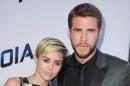 Miley Cyrus and Liam Hemsworth -- Getty Premium