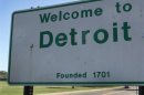 A 'Welcome to Detroit' border sign is seen as traffic enters Detroit