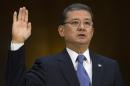 Veterans Affairs Secretary Eric Shinseki is sworn in on Capitol Hill in Washington, Thursday, May 15, 2014, prior to testify before the Senate Veterans Affairs Committee hearing to examine the state of Veterans Affairs health care. (AP Photo/Cliff Owen)