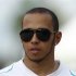 Mercedes Formula One driver Lewis Hamilton of Britain walks after the second practice session of the Malaysian F1 Grand Prix at Sepang International Circuit outside Kuala Lumpur
