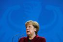 German Chancellor Merkel addresses a news conference after talks with Malta's Prime Minister Muscat at the chancellery in Berlin