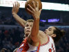 Los Angeles Clippers forward Blake Griffin, left, grabs a rebound over Chicago Bulls center Joakim Noah during the first half of an NBA basketball game, Tuesday, Dec. 11, 2012, in Chicago. (AP Photo/Charles Rex Arbogast)