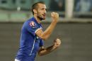 Italy's Giorgio Chiellini, right, celebrates after scoring during the Euro 2016 qualifying soccer match between Italy and Azerbaijan, at the La Favorita stadium, in Palermo, Italy, Friday, Oct. 10, 2014. (AP Photo/Antonio Calanni)