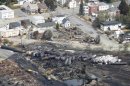 The remains of a burnt train are seen in Lac Megantic