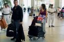 British tourists leave after finishing their holidays, at the airport of the Red Sea resort of Sharm el-Sheikh