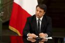 Italian Prime Minister Matteo Renzi attends a ceremony with Iran's President Hassan Rouhani to sign deals in Tehran