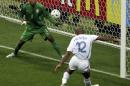 FILE - In this July 1, 2006 file photo, France's Thierry Henry, right, scores past Brazil goalkeeper Dida, during their World Cup quarterfinal soccer match, in Frankfurt, Germany. On this day: France beats Brazil 1-0 to claim a surprise semifinal berth. (AP Photo/ Lionel Cironneau, File)