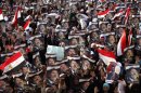 Women, who support deposed Egyptian President Mohamed Mursi, rally at the Rabaa Adawia square where they are camping in Cairo