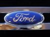 A Ford logo is seen on a car during a press preview at the 2013 New York International Auto Show in New York