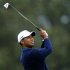 U.S. golfer Tiger Woods hits off the 17th tee of the north course at Torrey Pines during second round play at the Farmers Insurance Open in San Diego