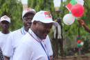 Burundi President Pierre Nkurunzinza (C) looks on during a party congress after his nomination as candidate for the next presidential election on April 25 in Bujumbura