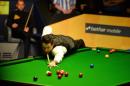 Ronnie O'Sullivan of England plays a shot in the final match of the World Snooker Championships at The Crucible in Sheffield, England, on May 6, 2013