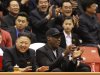 North Korean leader Kim Jong Un, left, and former NBA star Dennis Rodman watch North Korean and U.S. players in an exhibition basketball game at an arena in Pyongyang, North Korea, Thursday, Feb. 28, 2013. Rodman arrived in Pyongyang on Monday with three members of the Harlem Globetrotters basketball team to shoot an episode on North Korea for a new weekly HBO series. (AP Photo/VICE Media, Jason Mojica)
