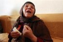 Mannoubiya, mother of Mohamed Bouazizi cries at her home in the Tunisian town of Sidi Bouzid
