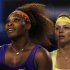 Serena Williams of the U.S. and Maria Kirilenko of Russia shake hands with the chair umpire after their women's singles match at the Australian Open tennis tournament in Melbourne
