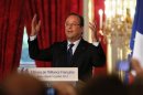 French President Francois Hollande delivers a speech during a ceremony to mark the 130th anniversary of the Alliance Francaise at the Elysee Palace in Paris