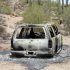 This image provided Saturday June 2, 2012, by the Pinal County Sheriff’s Office, shows the vehicle where five dead bodies burned  were found inside in Pinal County's Vekol Valley area, west of Casa Grande, N.M. Authorities say the inncident may be drug related. (AP Photo/ Pinal County Sheriff’s Office)