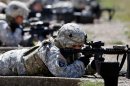 Services to Reveal Plans to Integrate Women in Combat
