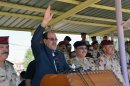 Iraqi PM Nuri al-Maliki gives a speech as he tours military posts on the outskirts of Baghdad on August 6, 2013