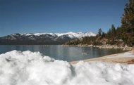 Snow is piled on a Lake Tahoe beach in Sand Harbor, Nevada February 3, 2012. REUTERS/Robert Galbraith