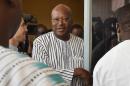 Burkina Faso's newly elected President Roch Marc Christian Kabore arrives in the Movement of the People of Progress (MPP) party's headquarters in Ouagadougou, on December 2, 2015