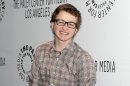 FILE - In this March 12, 2012 file photo, actor Angus T. Jones arrives at the Paleyfest panel discussion of the television series "Two and a Half Men" in Beverly Hills, Calif. Jones, the teenage actor who plays the half in the hit CBS comedy "Two and a Half Men" says it's "filth" and through a video posted by a Christian church has urged viewers not to watch it. (AP Photo/Dan Steinberg, File)