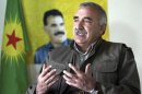 Karayilan, acting military commander of the PKK, speaks during an interview with Reuters at the Qandil mountains in Sulaimaniya