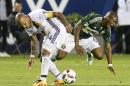 Los Angeles Galaxy midfielder Nigel de Jong, left, crashes into Portland Timbers midfielder Darlington Nagbe during the second half of an MLS soccer game in Carson, Calif., Sunday April 10, 2016. The game ended in a 1-1 draw. (AP Photo/Ringo H.W. Chiu)