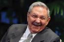 Cuban President Raul Castro laughs on September 27, 2013 during a meeting at Revolution Palace in Havana