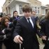 Former Illinois Governor Rod Blagojevich and his wife Patti leave their home heading to federal court for his sentencing hearing in Chicago, Tuesday, Dec. 6, 2011.   Blagojevich was convicted earlier this year on 18 corruption counts, including trying to auction off President Barack Obama's old U.S. Senate seat.    (AP Photo/Paul Beaty)