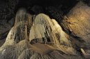 One of the world's largest stalagmites dominates the main chamber of the Cathedral Cave near Wellington