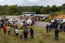 Relatives of prisoners gather near riot police at a checkpoint close to the prison where around 60 people were killed in a prison riot in the Amazon jungle city of Manaus