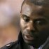 Former Bolton Wanderers player Fabrice Muamba cries as he returns to White Hart Lane for the first time since suffering almost fatal heart failure during a match there earlier this year in London