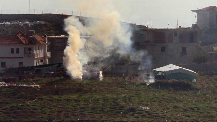 Smoke rises as workers burn stalks of cannabis in Lazarat, near the city of Gjirokastra, Albania on November 3, 2013