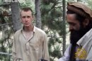 FILE - This file image provided by IntelCenter on Wednesday Dec. 8, 2010 shows a framegrab from a video released by the Taliban containing footage of a man believed to be Sgt. Bowe Bergdahl, left. A U.S. soldier held by Afghan militants will not be harmed, a senior member of the Pakistan-based Haqqani network told The Associated Press on Saturday, Sept. 8, 2012. However, the United States and NATO can expect stepped up attacks as a result of the Obama administration's decision to declare the network of fighters a terrorist body, he said. He denied an earlier report that the only U.S. prisoner of war, Army Sgt. Bowe Bergdahl would be harmed as a result of the administration's decision.(AP Photo/IntelCenter, File) MANDATORY CREDIT: INTELCENTER; NO SALES; EDS NOTE: "INTELCENTER" AT LEFT TOP CORNER ADDED BY SOURCE