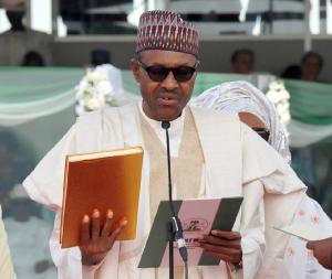 Nigerian President Mohammadu Buhari swears to an oath …