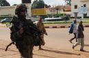 A French soldier patrols in the streets of Bangui on December 7, 2013