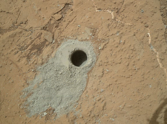 Curiosity Rover Finds Water on Mars Curiosity_Rover_Drills_Into_Mars-1ccdf234cf778bacbfb55847b351fcfa