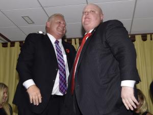 Toronto Mayor Rob Ford, right, consoles his brother …