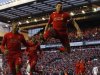 Liverpool's Gerrard celebrates scoring against Tottenham Hotspur during their English Premier League soccer match in Liverpool