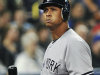 New York Yankees' Alex Rodriguez walks off field after striking out against the Toronto Blue Jays during the fourth inning of a baseball game in Toronto, Thursday, Sept. 27, 2012. (AP Photo/The Canadian Press, Aaron Vincent Elkaim)