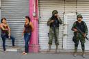 Mexican soldiers patrol the streets of Apatzingan, in Michoacan State, Mexico