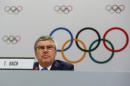 FILE- In this Monday, Aug. 3, 2015 file photo, IOC President Thomas Bach speaks at a press conference after the 128th IOC session in Kuala Lumpur, Malaysia. Bach said Wednesday May 18, 2016 entire sports federations could be suspended if allegations of state-supported Russian doping at the 2014 Sochi Olympics are proven. (AP Photo/Joshua Paul, File)