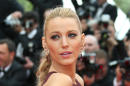 American actress Blake Lively poses for photographers on the red carpet during the opening ceremony and the screening of Grace of Monaco at the 67th international film festival, Cannes, southern France, Wednesday, May 14, 2014. (Photo by Joel Ryan/Invision/AP)
