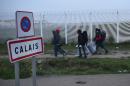 Calais migrant camp shows signs of hasty departures