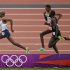 Britain's Mo Farah sprints for the finish ahead of Ethiopia's Dejen Gebremeskel and Kenya's Thomas Pkemei Longosiwa in the men's 5000m final at the London 2012 Olympic Games