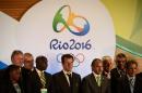 Brazil's head coach Dunga (C) poses with other coaches after the draw for the Rio 2016 Olympic football tournament at Maracana stadium in Rio de Janeiro on April 14, 2016