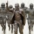 This is the statue of former Penn State University head football coach Joe Paterno that stands outside Beaver Stadium in State College, Pa., Friday, July 13, 2012. After an eight-month inquiry, Former FBI director Louis Freeh's firm produced a 267-page report that concluded that Paterno and other top Penn State officials hushed up child sex abuse allegations against former Penn State assistant football coach Jerry Sandusky for more than a decade for fear of bad publicity, allowing Sandusky to prey on other youngsters. The revelations contained in the report have stirred a debate over whether the statue should remain. (AP Photo/Gene J. Puskar)